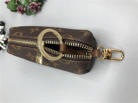 louis vuitton key pouch vs 6 key holder|Louis Vuitton coin pouch keychain.